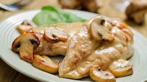 Escalope de poulet  sauce aux champignons
